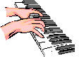 Hands playing the piano